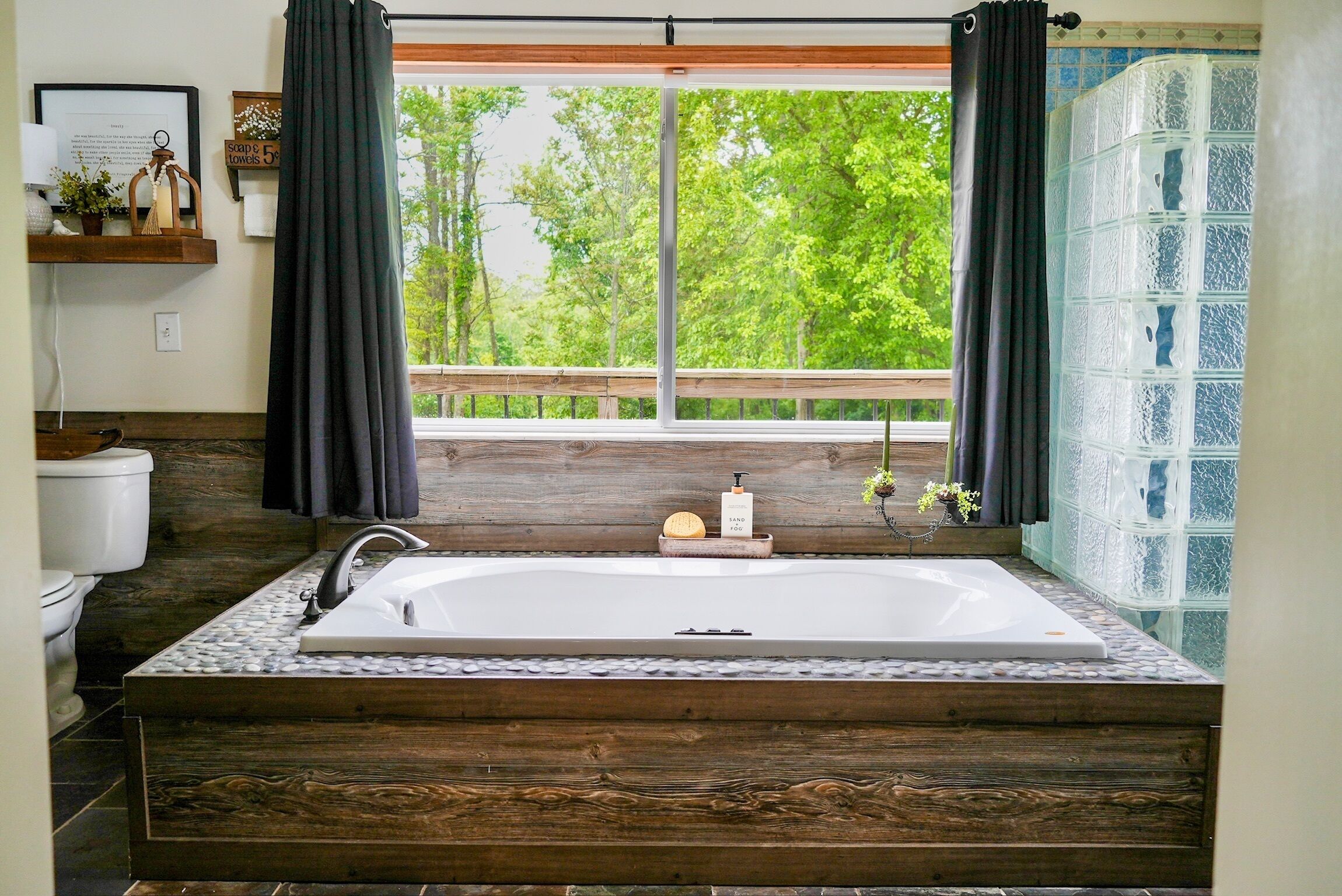 Jetted tub, hair dryer, towels, soap