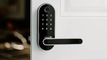 A door with a numeric keypad lock.