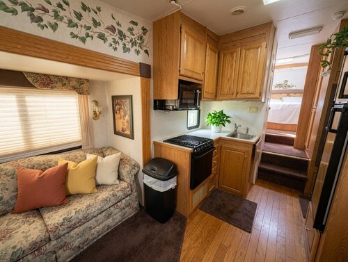 Cozy 1-bedroom recreational vehicle with private beach accesses site included.