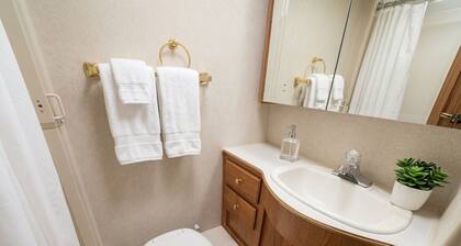 Cozy 1-bedroom recreational vehicle with private beach accesses site included.