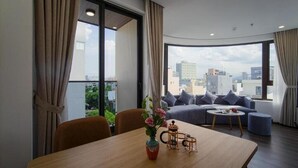 Superior Apartment, Balcony, City View | Dining - HSuites Riverside Hotel & Apartment  (An Hai)