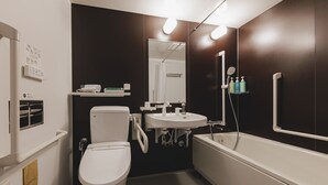 A modern bathroom with a toilet, sink, and bathtub. - Hotel Route Inn Tamba-Hikami Inter- (Tamba)