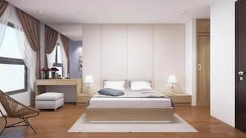 A modern bedroom with a large bed, bedside tables, a desk, and a chair.