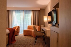 Quarto quádruplo conforto, sacada | Área de estar