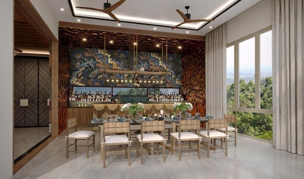A bar area with a large mural, multiple seating arrangements, and a view of the outdoors.