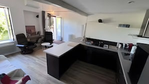 Private kitchen - “Liminalis” Apartment with Private Terrace, Garden, and Wi-Fi (Saint-Martin-Petit)
