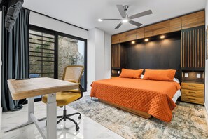 A modern bedroom with a large bed, a desk, and a chair. - Casa Lúmina an Elevated Escape in Puerto Vallarta (Puerto Vallarta)