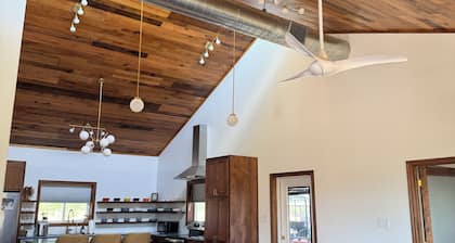 The Barndo: 2-bedroom barndominium with modern architecture in a rural setting