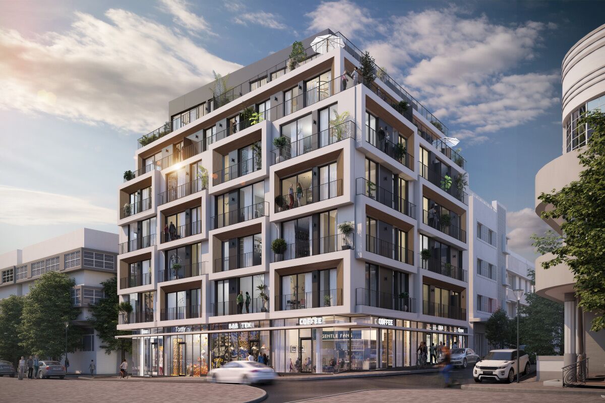 A multi-story hotel with balconies, a ground-level coffee shop, and a visible storefront.