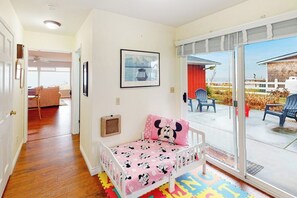 A child's bedroom with a bed, a window, and a view of the outside. - Prime 1BR Oceanfront Dog Friendly - Patio - Washer Dryer (Port Angeles)