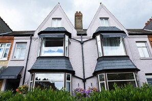A corner building with two visible windows and a balcony, labeled 'Fenners Hotel'. - Cambridge House Hotel (Cambridge)