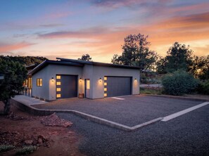 A modern two-story house with a driveway, garage, and landscaped garden. - Blazing Elephant - Stunning VIEWS, Pet Friendly, Central Location (Sedona)