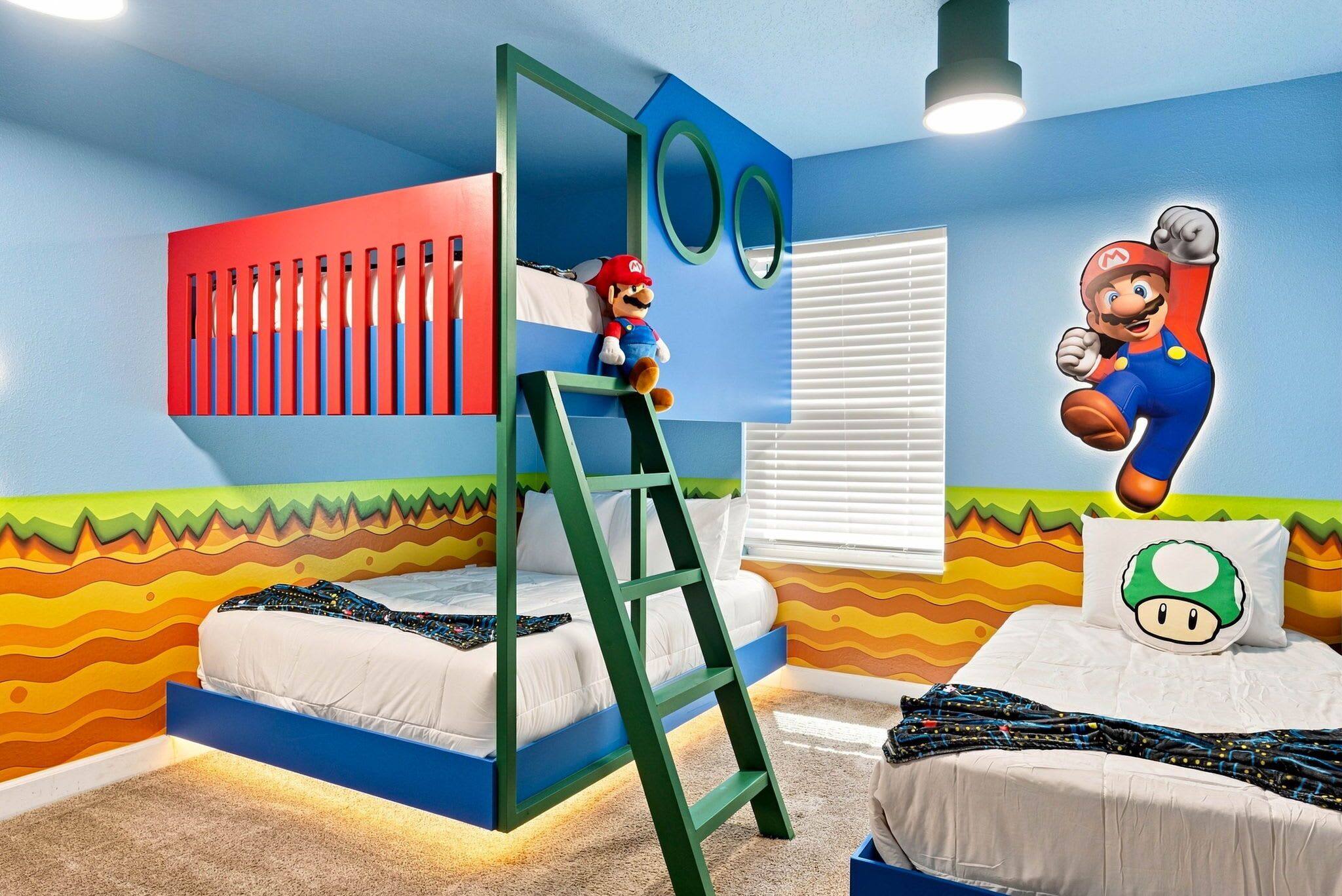 A bedroom with a bunk bed, a ladder, a window with blinds, and a wall with a Mario character.