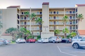 A multi-story hotel with a central entrance labeled 'Saida I 400'. - Saida Towers I #402 - Oceanfront, Pools & Hot Tub (South Padre Island)