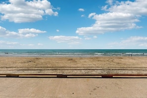 A beach with a clear sky and waves. - Island House #105 - Heated Pool & Outdoor Patio (Corpus Christi)