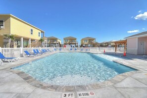 A swimming pool with lounge chairs, a no diving sign, and a 3 ft depth marker. - Rockport Relaxation - Shared Pool, Golf Nearby (Rockport)