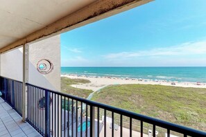 A balcony with a view of a beach and ocean. - Suntide II Condominiums #509 (South Padre Island)