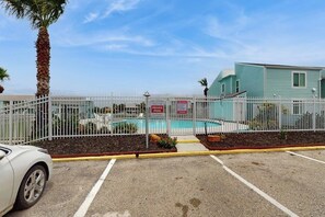 A gated pool area with a sign indicating it is private. - Belle of the Bay - Boat Slip, Pool & Tennis (Rockport)