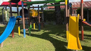 A playground with slides and climbing structures.