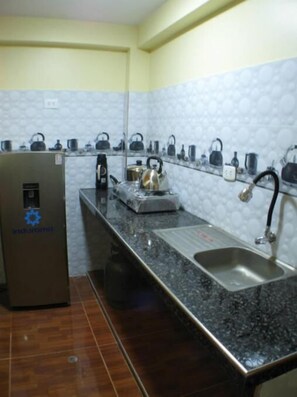 Unclassified image, 4 of 14, button - IMASMATI WASI (Pisac)