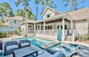 A house with a swimming pool, outdoor furniture, and a covered porch. - Private Pool, Walk to Grayton Beach- Grayton Pointe by Royal Destinations (Santa Rosa Beach)