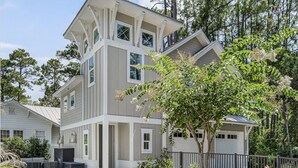 A multi-story house with a pool, surrounded by trees and a fence. - Private Pool, Walk to Grayton Beach- Grayton Pointe by Royal Destinations (Santa Rosa Beach)
