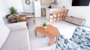 Deluxe-Villa, Balkon, Poolblick | Wohnbereich