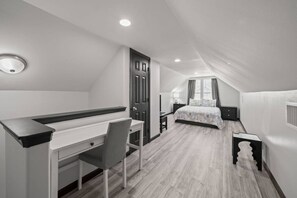 A bedroom with a desk, chair, bed, and a window with curtains. - Cozy 3-Bedroom Suburban Retreat near Downtown (Houston)