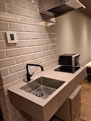 Habitación doble Deluxe de uso individual, vista al resort | Cocina privada