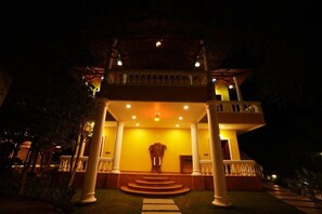 A building with a central entrance, columns, and a statue. - Brown Town Resort Spa and Convention  (Hyderabad)