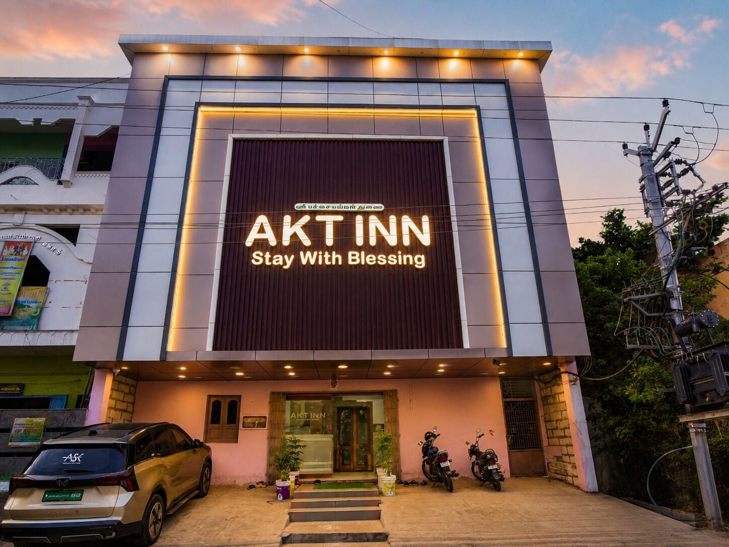 A building with a sign reading 'AKTINN Stay With Blessing'.
