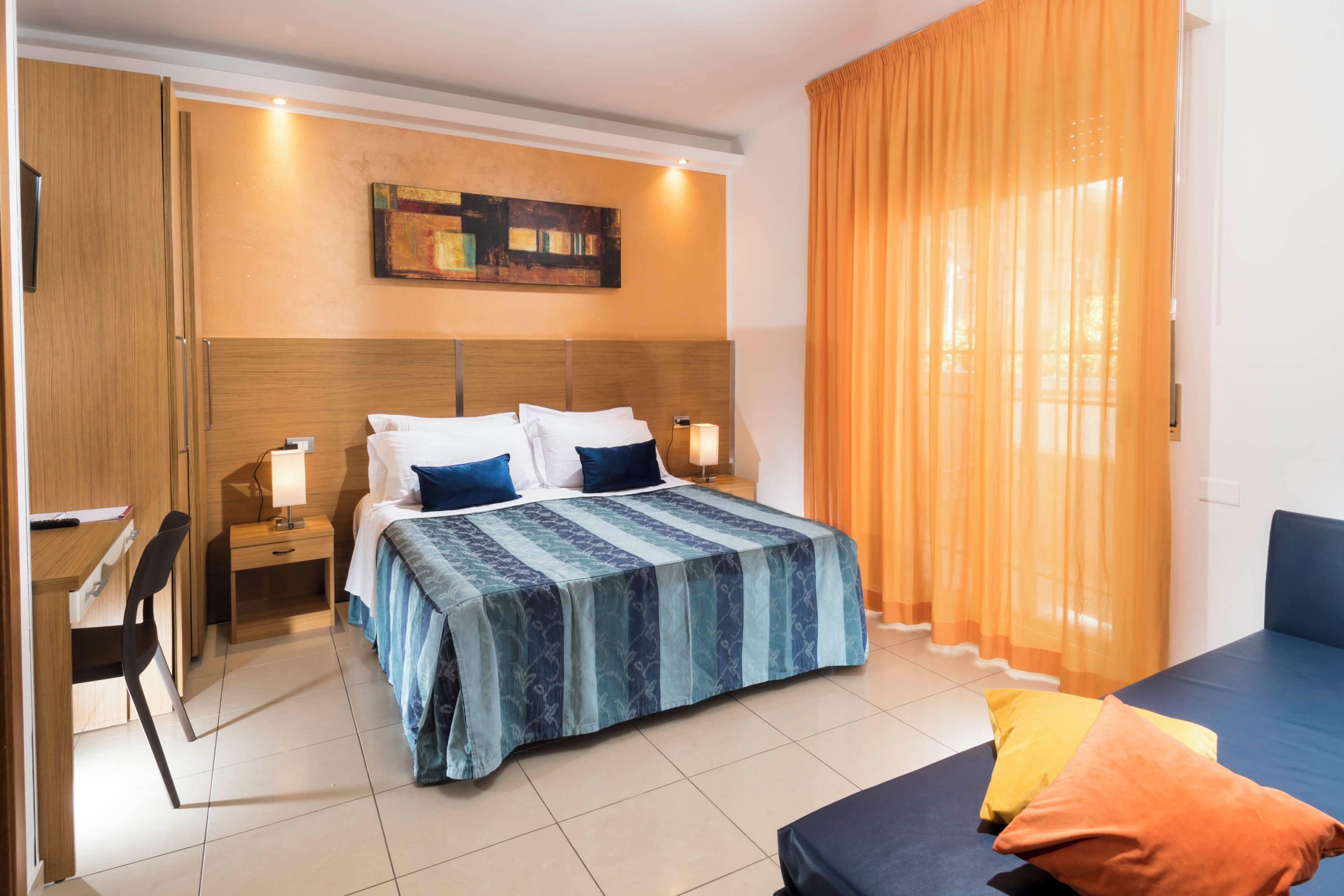 Economy Apartment, Balcony, Courtyard View | In-room safe, desk, soundproofing, iron/ironing board