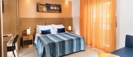 Economy Apartment, Balcony, Courtyard View | In-room safe, desk, soundproofing, iron/ironing board