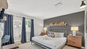 Room - Riverfront loft just steps from Broadway! Enjoy a king bed, pool, gym, free parking, and modern comforts in this stylish retreat overlooking the Cumberland River. Walk to honky tonks, Nissan Stadium, dining, and live music. (Nashville)