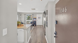 Lobby - Riverfront loft just steps from Broadway! Enjoy a king bed, pool, gym, free parking, and modern comforts in this stylish retreat overlooking the Cumberland River. Walk to honky tonks, Nissan Stadium, dining, and live music. (Nashville)