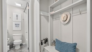 Bathroom - Riverfront loft just steps from Broadway! Enjoy a king bed, pool, gym, free parking, and modern comforts in this stylish retreat overlooking the Cumberland River. Walk to honky tonks, Nissan Stadium, dining, and live music. (Nashville)