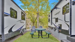 Unclassified image, 2 of 18, button - RV Rental D22 - Keystone Passport 32ft (Madras)
