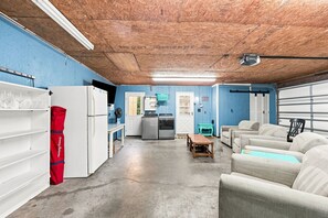 A compact kitchen with a refrigerator, microwave, and sink. - Laid Back Laurel-Pet Friendly in Beaufort, NC (Beaufort)