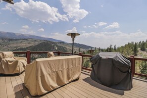 An outdoor deck with a view of a mountainous landscape. - 947 Blue Ridge 4 Bedroom Home (Silverthorne)