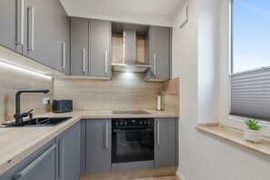 Private kitchen - Apartment in A Hotel 'Blickallee' (Havixbeck)