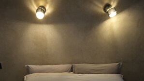 A bed with white bedding and two wall-mounted lights. - Cedar, Lime & Light – A Boutique Auberge at Chefchaouen's Historic Gate (Chefchaouen)