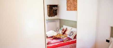 Departamento (1 Bedroom) | 1 habitación, tabla de planchar con plancha, cunas y ropa de cama