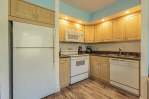 Your fully equipped kitchen has everything you need to whip up a quick breakfast or a hearty meal. - Ocean View Maui Studio Papakea C204 Near Kaanapali Beach (Lahaina)