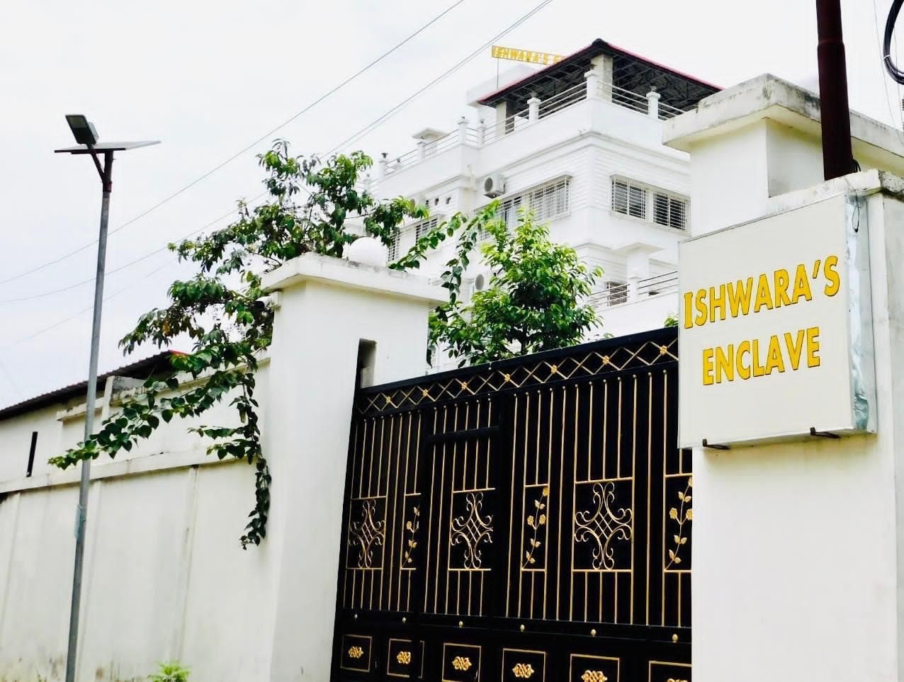 A gated entrance with a sign reading 'ISHWARA'S ENCLAVE.'