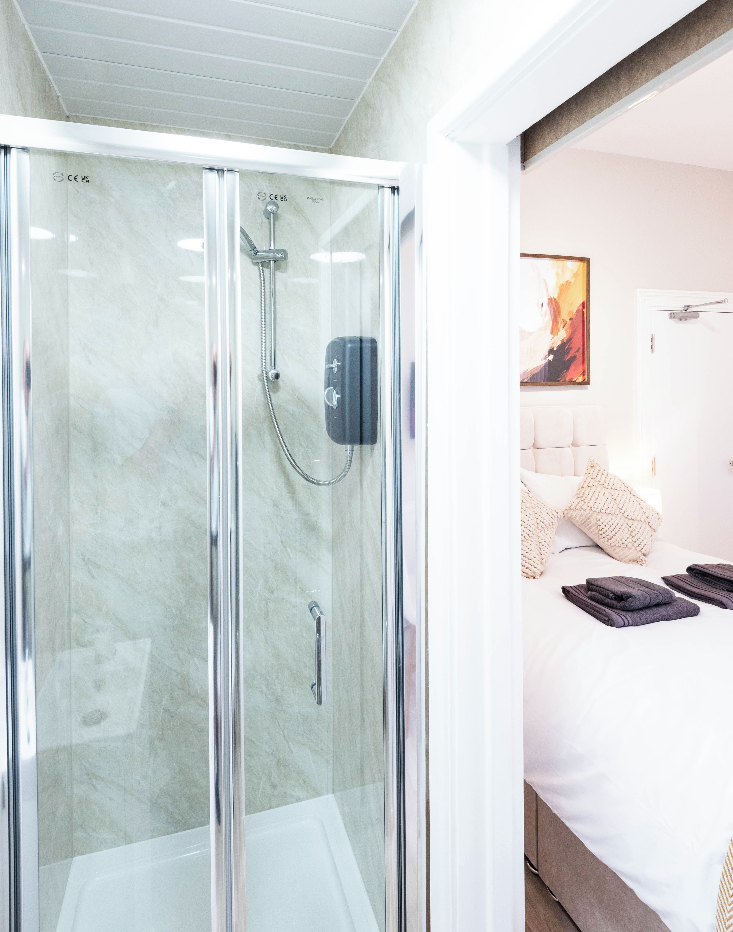 Shower, towels, toilet paper
