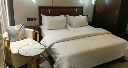 W BY TRIPLE TEES HOTEL AND SUITE