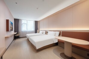 A hotel room with two beds, a desk, and a seating area. - G Jinhua Hotel Apartments - Shanghai (Shanghai)