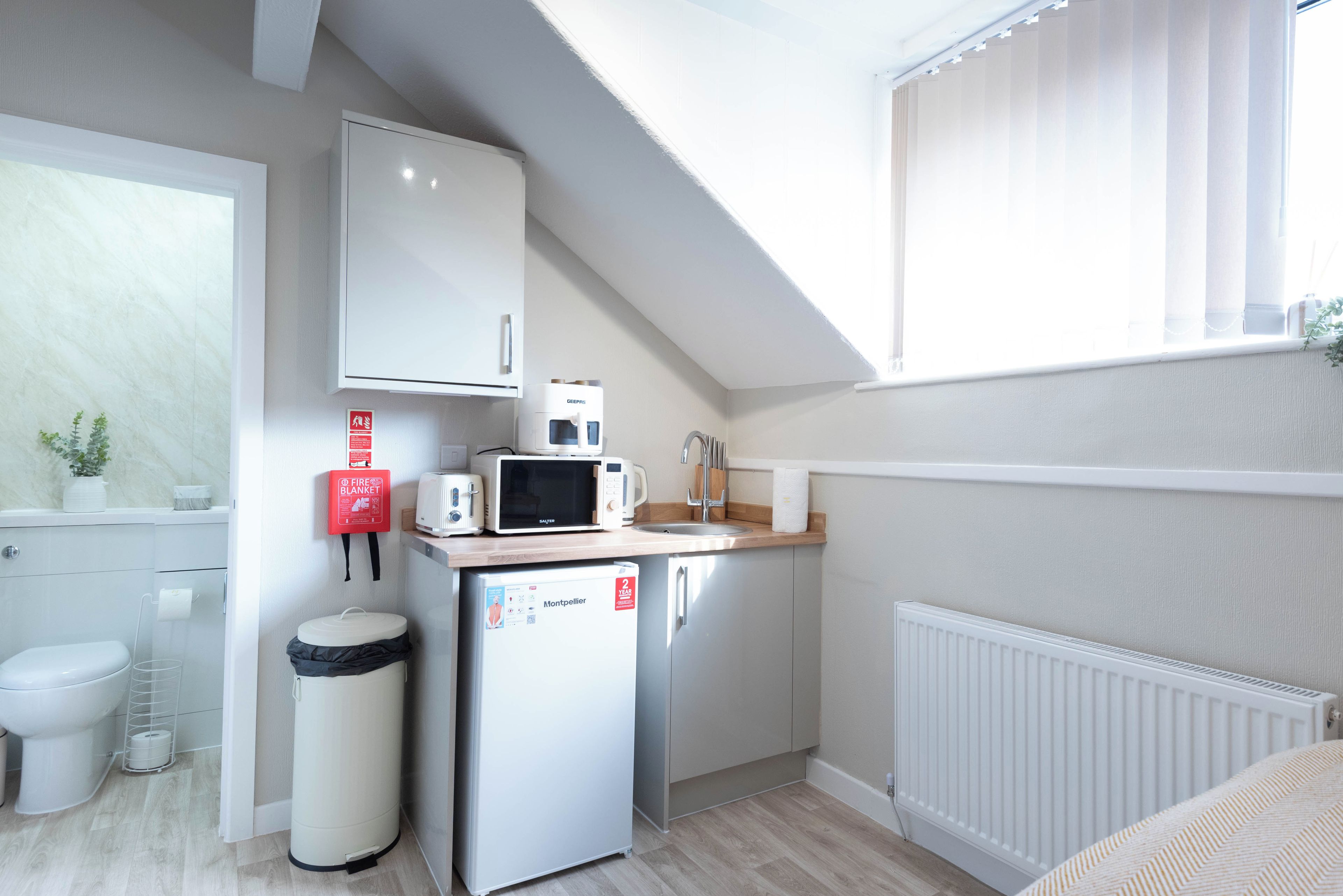 Fridge, microwave, electric kettle, toaster