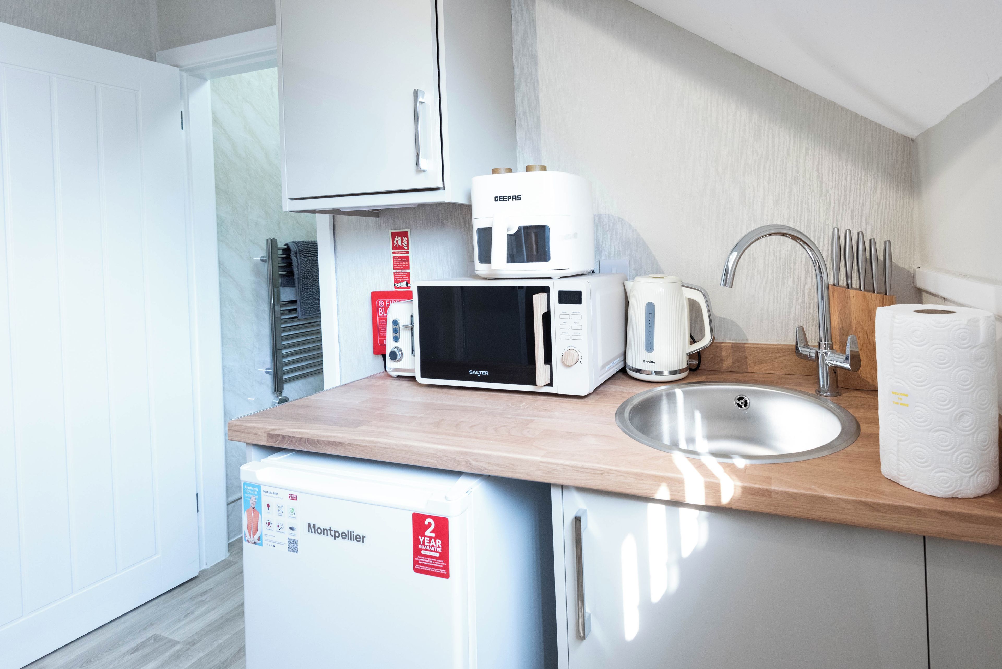 Fridge, microwave, electric kettle, toaster