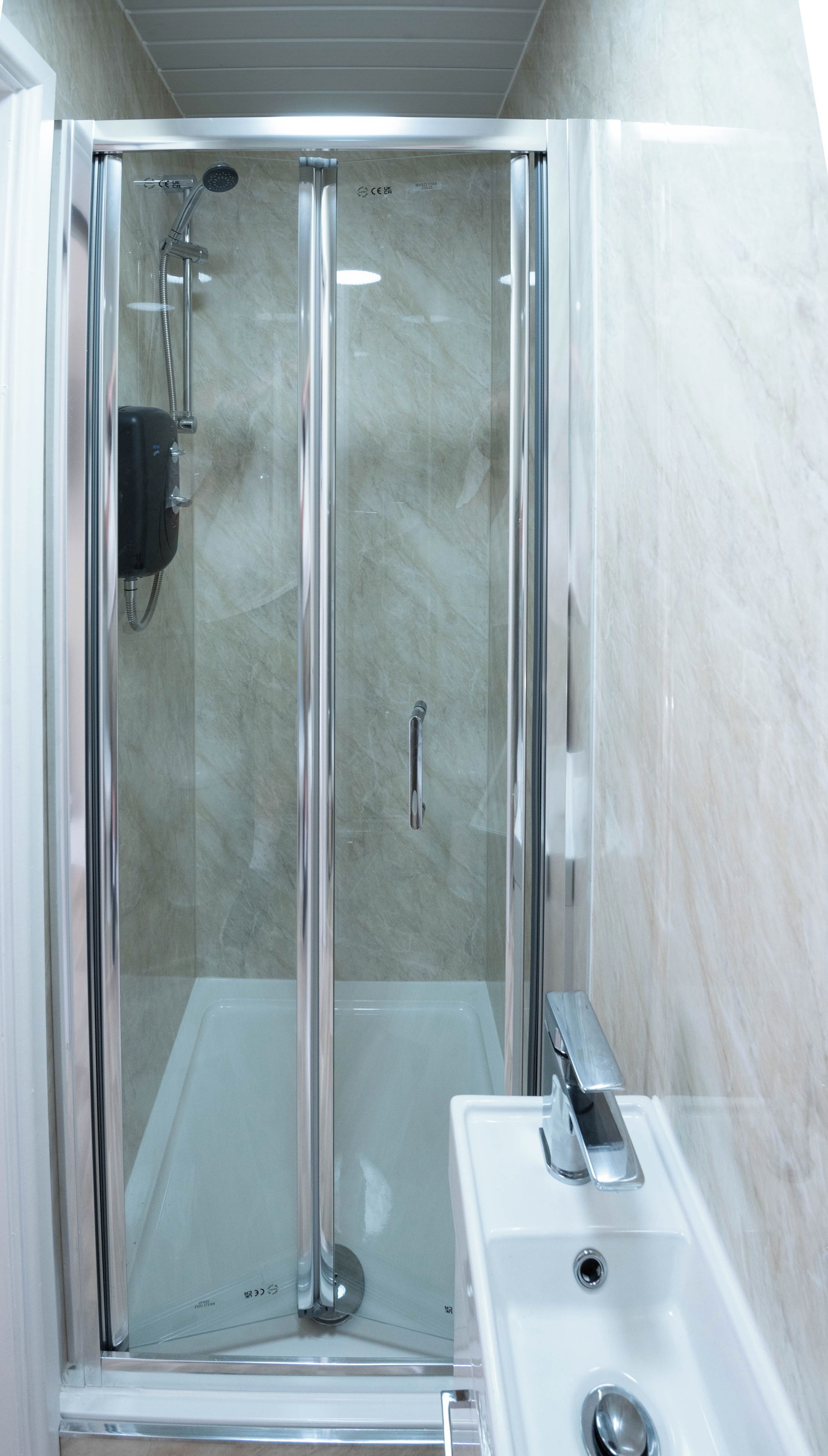 Shower, towels, toilet paper